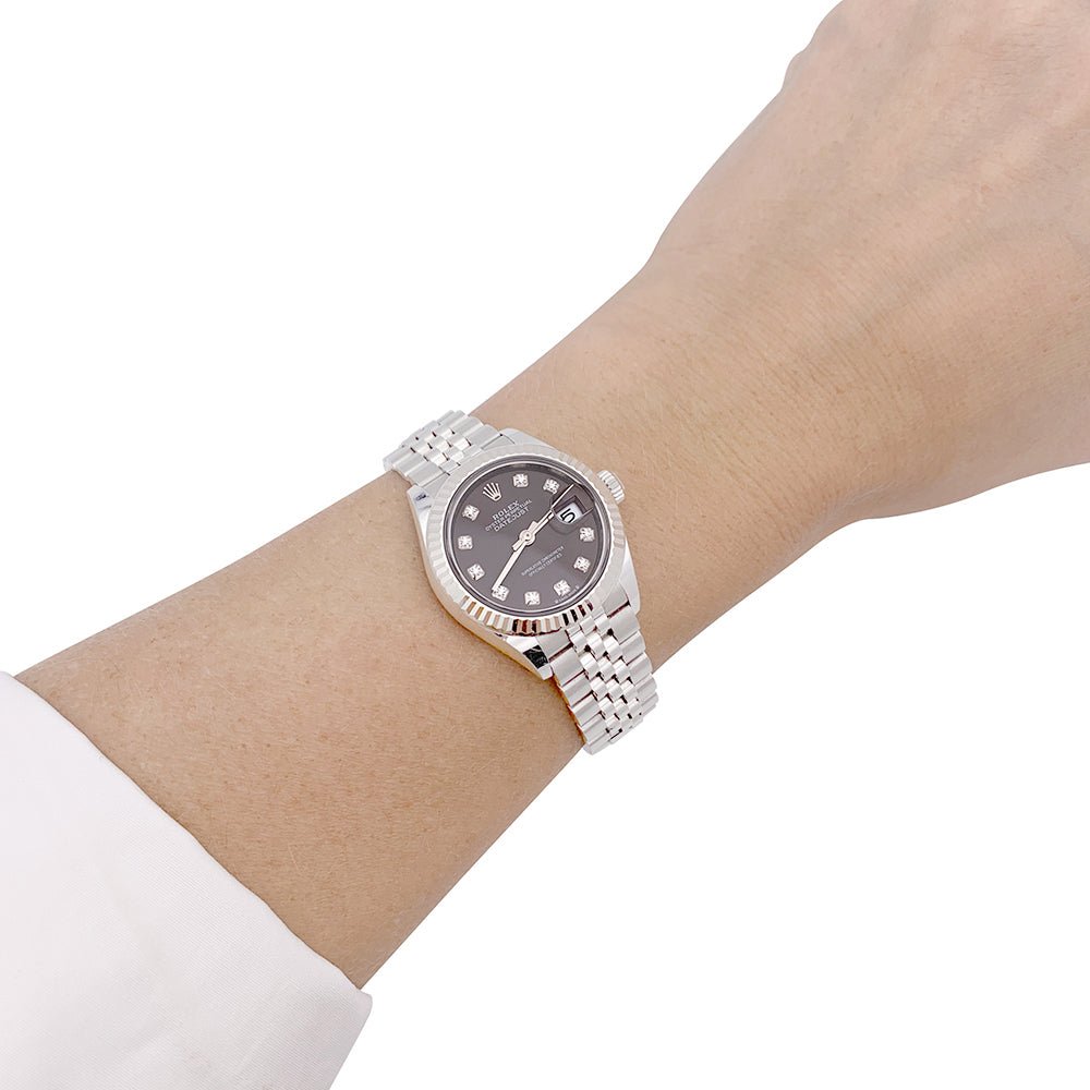 Montre Rolex "Datejust", acier, or blanc et diamants. - Castafiore