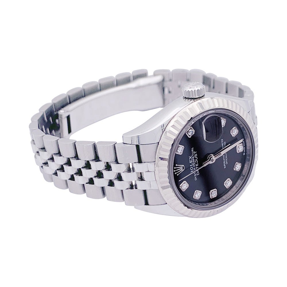 Montre Rolex "Datejust", acier, or blanc et diamants. - Castafiore