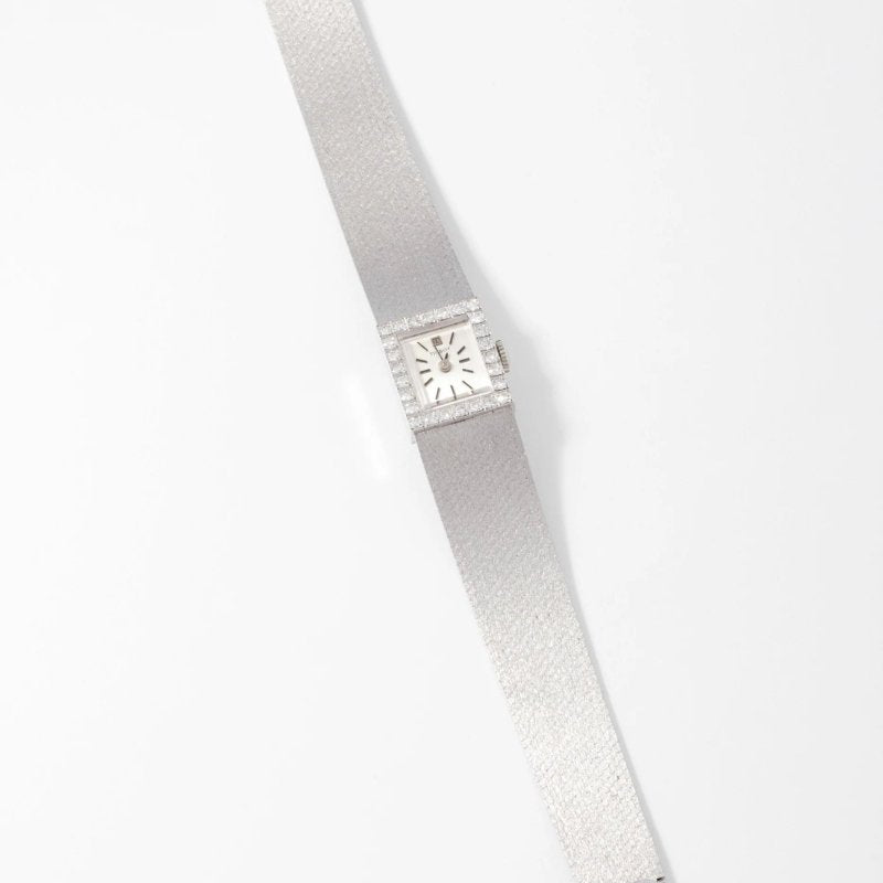 Montre Tissot or gris et diamant datant des années 1960 - Castafiore