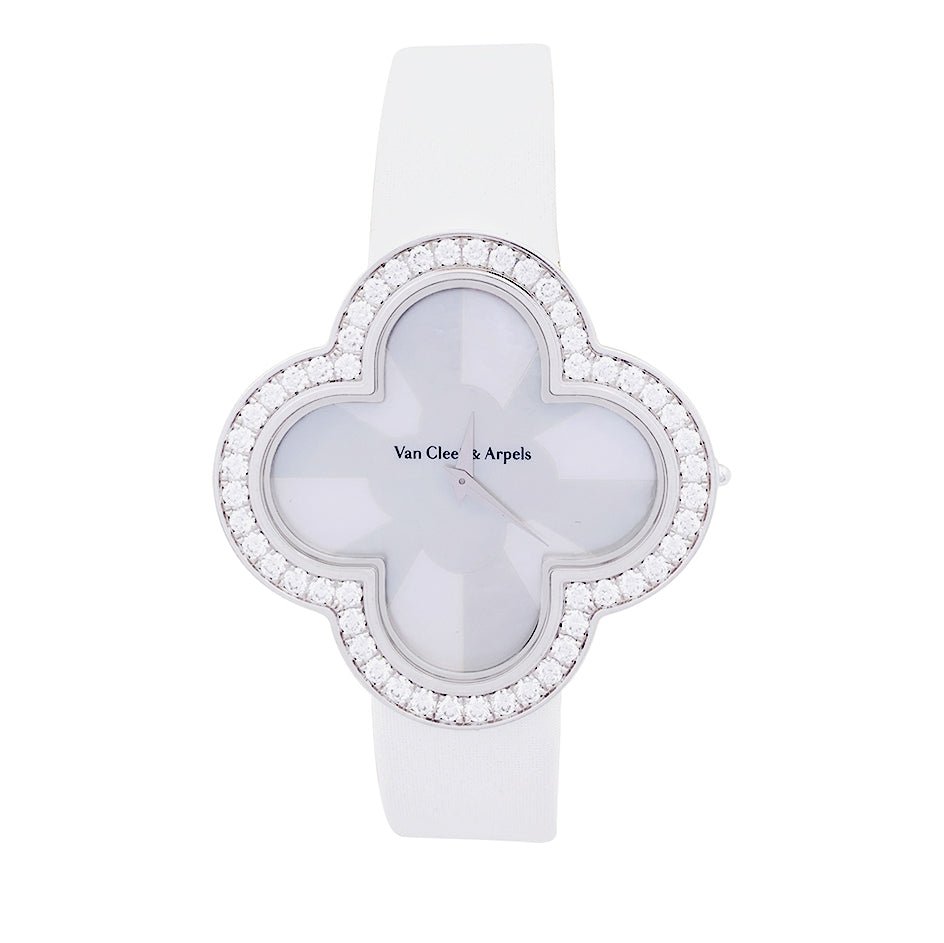 Montre Van Cleef & Arpels, "Alhambra", or blanc, diamants. - Castafiore