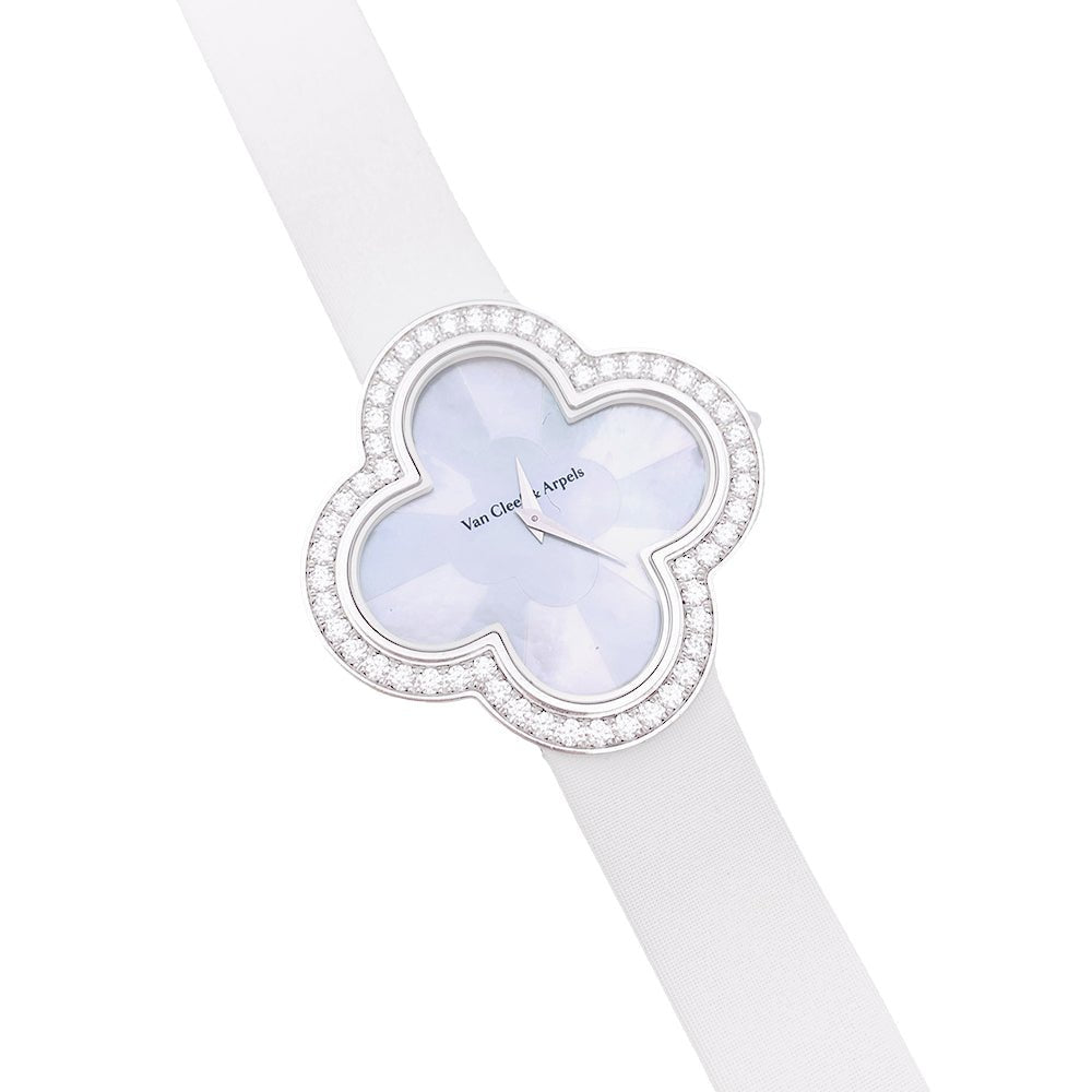 Montre Van Cleef & Arpels, "Alhambra", or blanc, diamants. - Castafiore