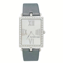 Montre VAN CLEEF & ARPELS "Classique Arpels" en or blanc, diamants, nacre et satin - Castafiore