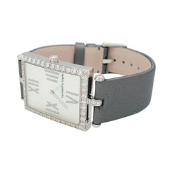Montre VAN CLEEF & ARPELS "Classique Arpels" en or blanc, diamants, nacre et satin - Castafiore