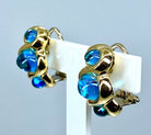 Paire de boucles d’oreilles en or jaune et or blanc 18 carats en topazes cabochons - Castafiore