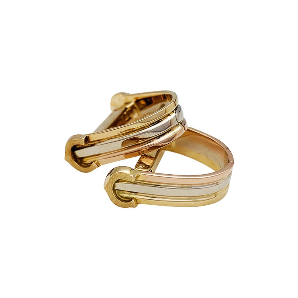 Paire de boutons de manchettes CARTIER "Mini Ressort CC" trois ors. - Castafiore