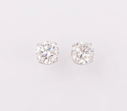 Paire de puce en diamant sur or gris 4 griffes - Castafiore