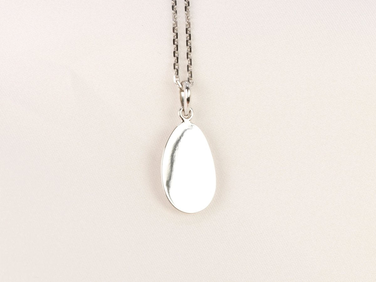 Pendentif ancien ovoide en or blanc et diamants taille ancienne - Castafiore