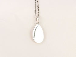 Pendentif ancien ovoide en or blanc et diamants taille ancienne - Castafiore