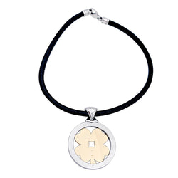 Pendentif Bulgari, "Tondo Trèfle", acier, or jaune. - Castafiore