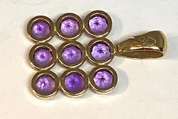 Pendentif en or 18 carats serti de 9 améthystes - Castafiore