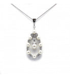 Pendentif goutte en or blanc, diamants et perles - Castafiore