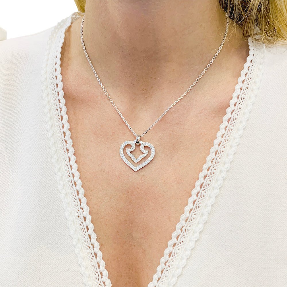 Pendentif O.J. PERRIN, "Coeur Légende" en or blanc et diamants - Castafiore
