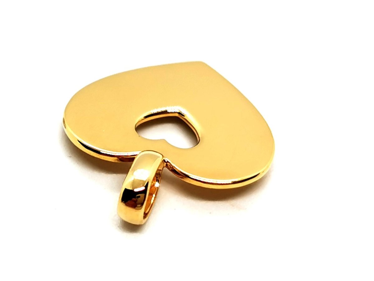 Pendentif POIRAY "Coeur secret" en or jaune - Castafiore