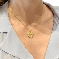 Pendentif Poiray, "Coeur secret", en or jaune et diamants - Castafiore