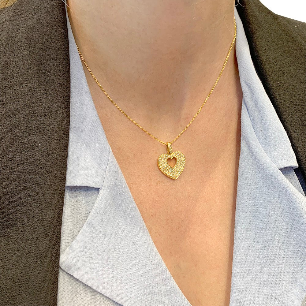 Pendentif Poiray, "Coeur secret", en or jaune et diamants - Castafiore
