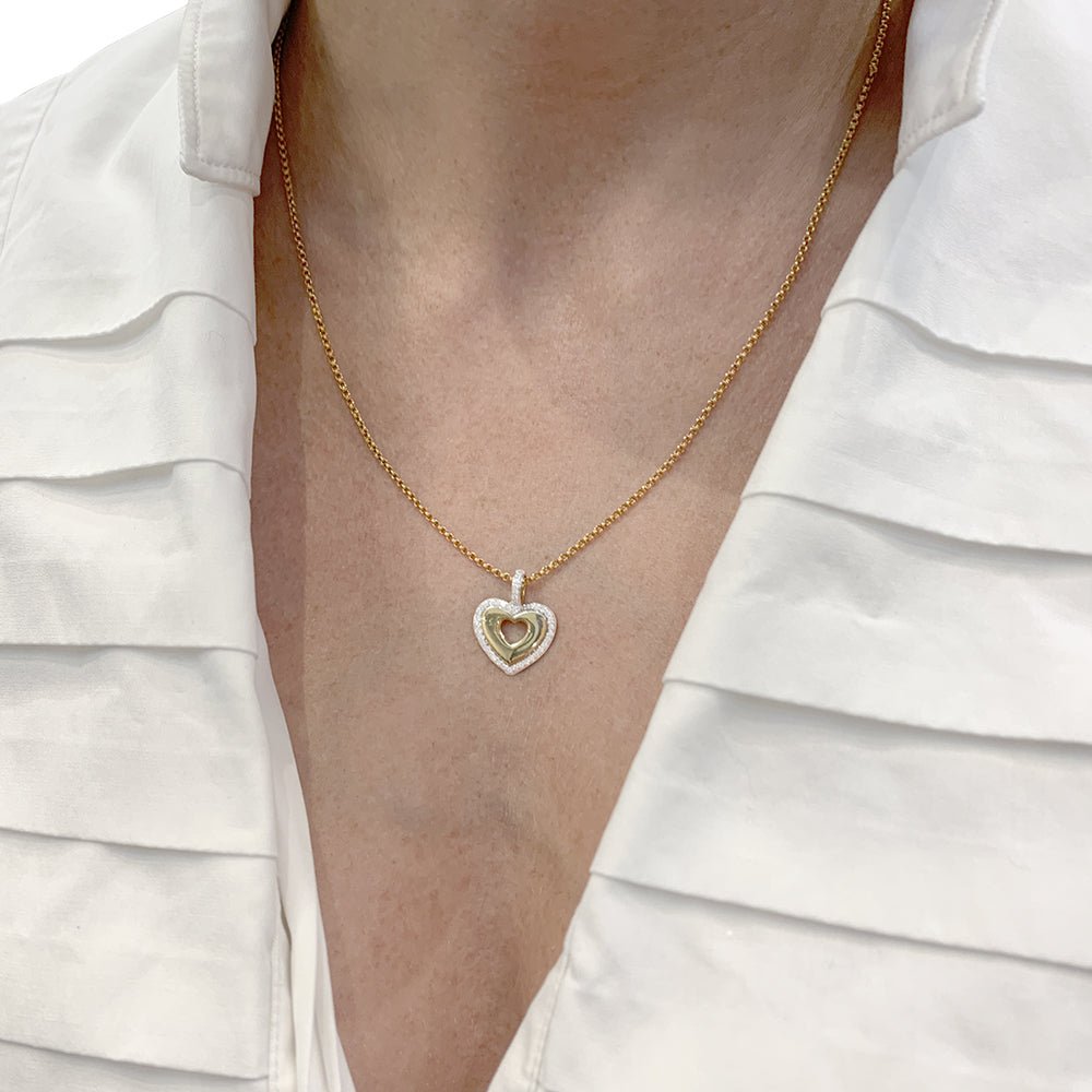 Pendentif Poiray, "Coeur secret", or jaune, or blanc et diamants. - Castafiore