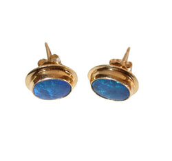 Puces d'oreilles serties d'opales noires en or jaune - Castafiore