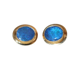 Puces d'oreilles serties d'opales noires en or jaune - Castafiore