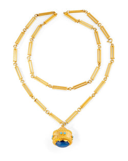 Sautoir en or jaune torsadé formé de bâtonnets et pendentif breloque avec turquoise - Castafiore