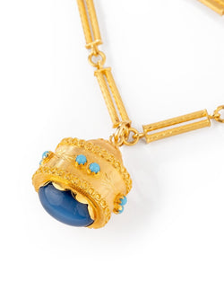 Sautoir en or jaune torsadé formé de bâtonnets et pendentif breloque avec turquoise - Castafiore