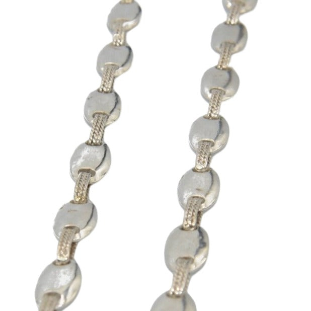 Sautoir signé de la maison hermès graine de café en argent - Castafiore