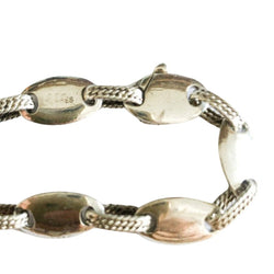 Sautoir signé de la maison hermès graine de café en argent - Castafiore