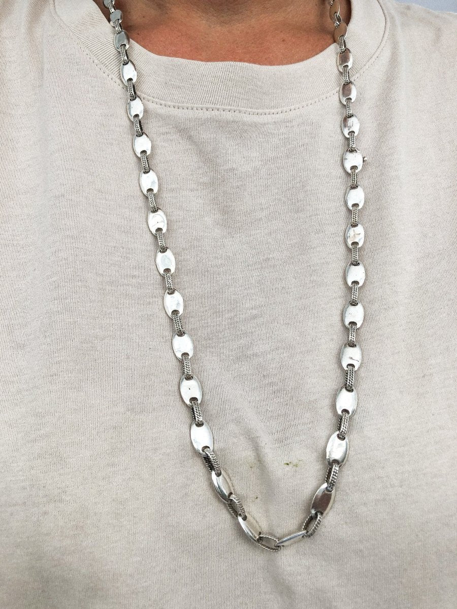 Sautoir signé de la maison hermès graine de café en argent - Castafiore