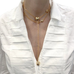 Sautoir transformable Chanel, “Les Infinis de Camélia”, en or rose, diamants. - Castafiore