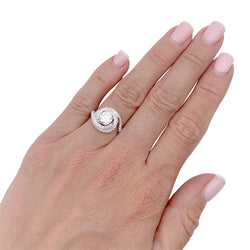 Solitaire Cartier, "Trinity Ruban", platine et diamants. - Castafiore