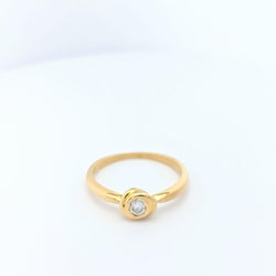 Solitaire d’inspiration florale en or jaune et diamant - Castafiore