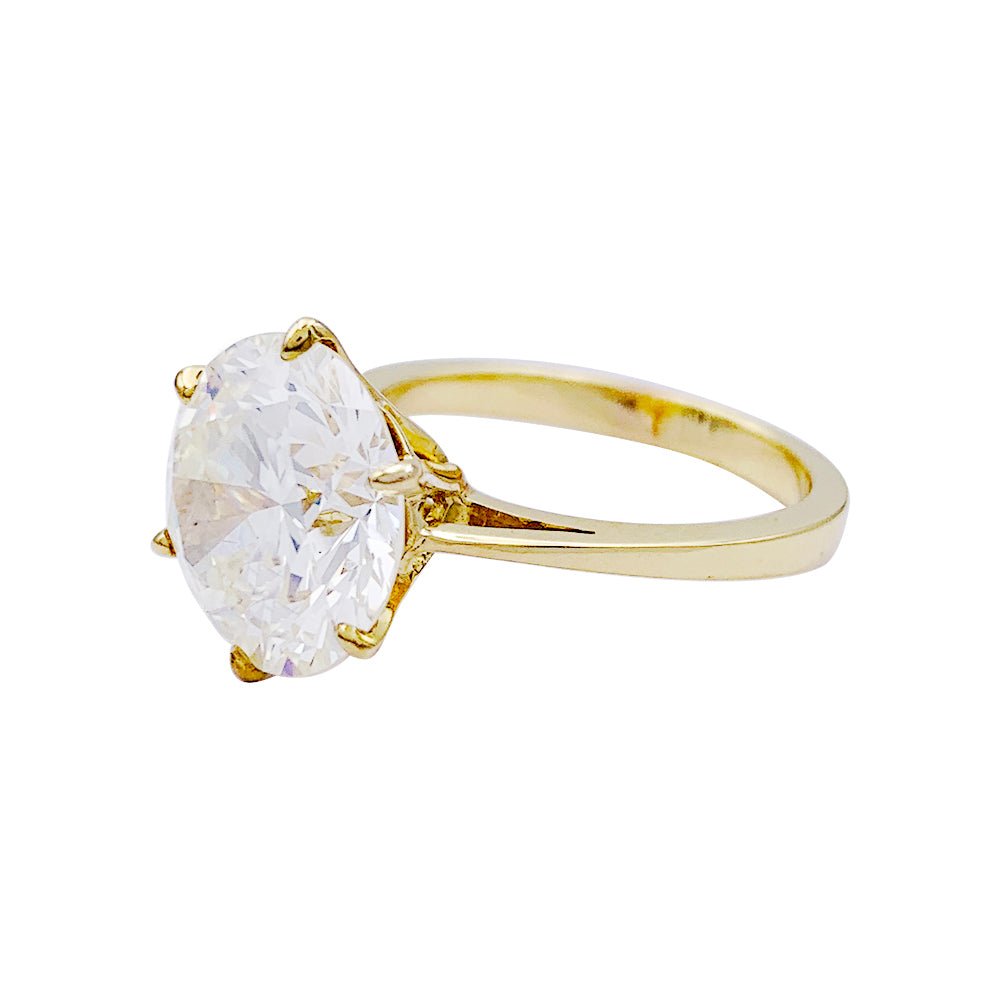 Solitaire en or jaune, diamant 5,77 cts. - Castafiore
